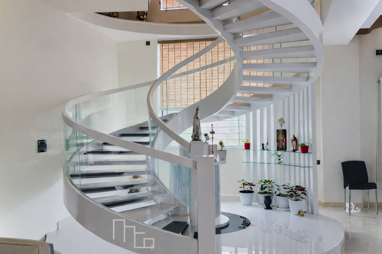 Modern helical steel staircase with aesthetic detailing in Chennai, Tamil Nadu